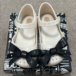 Mini Melissa Cream and Black Dress Shoes with Bow